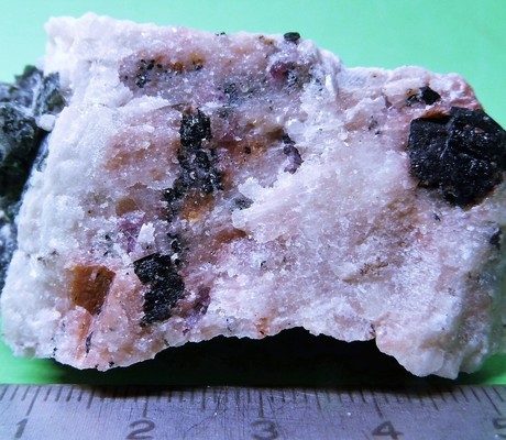 <a href="/photo-852504.html"><h1>Hibonite</h1><h2>Andranondambo sapphire deposits, Maromby, Amboasary Sud District, Anosy, Madagascar</h2><p>Black Hibonite on matrix.

Bought at an exhibition of sales-purchases-exchange of minerals and fossils.</p><p class="clickhere">Click here to view photo page on mindat.org</p></a>